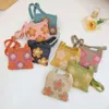 Netizen Same Style Children's Smiling Face Sunflower Knitted Baby Outgoing Decoration Woolen One Shoulder Crossbody Bag 78% factory wholesale