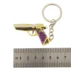 MINI PURPLE GOLD GOLD TRENDY GUN GUN PER MODELLO PER MODELLO PENDANTE SPINDANTE 5CM TEECHIN MATERIALE METALLA DI METALLA A ZINCI