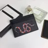 Concepteur de luxe Coin à main porte-carte porteuse femme sache clés masque vintage portefeuille portefeuille en cuir supports