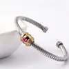 Fashion en acier inoxydable Twisted Split Ring Zirconia Bracles pour femmes Bijoux de luxe personnalisé de luxe 240510