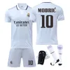 Sets/Soccer Sets/Sight Suits Mens Track Supsuits New 2223 Real Madrid Football Shirt Mens No. 10 Modric No. 9 Benzema Camisa de fútbol de fútbol Camisa de entrenamiento para niños Camisa de equipo