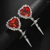 Boucles d'oreilles Backs Clip de coeur en cristal rouge sur un pendentif métal