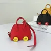 Keychains Designer de mulher de alta qualidade Backpack Keyrings Pingente mini -roda bolsa de casca de roda pendente