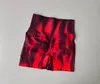 Fitness shorts van vrouwen met hoge taille en strakke buikdie geverfde perzik rode billen mooie benen 240508