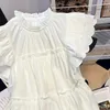 Blouses des femmes chemises blanches et y2k vintage coréen harajuku 2000s modes élégantes à manches courtes à manches courantes