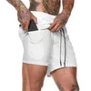 Shorts masculins Double double 2-en-1 Pantalon de fitness de mode multifonctionnel serré à l'intérieur et à la recherche de shorts anti-exposition extérieurs.