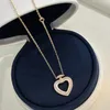 Collane a ciondolo 925 Gioielli di moda a mezza zircone del cuore di pesca argento sterling (DJ2311)