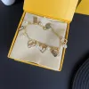 Designer -Armband -Ohrring für Frauen Luxusschmuck Perle Hoops Gold Armreif F Bag Anhänger Armbänder