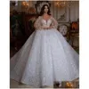 A-line suknie ślubne 2024 Arabskie długie rękawy Perły Kryształy Kryształy cekinowe satynowe suknie ślubne luksusowe sukienkę do balownania Dubai imperium