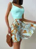 Двух кусочков для женщин мини -принт короткий плиссированный наборы юбки 2 куска цветочной юбки из камизола белая одежда для сексуальной клубной вечеринки 240509