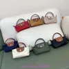 Designer Bag -winkels zijn 95% korting op Mini Single Handle Dumpling Mobiele telefoon Portable Zero Wallet Dames Clothjug7