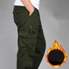 Calça masculina masculina algodão de algodão de algodão quente calças calças de corrida capa à prova de vento masculinos bolsos soltos de corrida de calças militares Tactical Military Pantsl2405