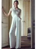 Pantalon de deux pièces pour femmes Fitshinling DP V Neck Elegant Jumpsuit Femmes Slim Slveless Rober 2022 Été Sexy Sexy Sexy Wide Jam Sautpuise Fashion White T240508