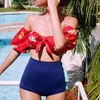 Swimons de maillots de bain chinois Red Swimsuit Split Two Piece Bikini High Taist One épaule Later Col Saida de Praia