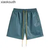 Short designer di fascia alta rhude per lettere Chaopai ricamato pantaloncini in pelle elastica ricamato per uomini e donne High Street Beach Sports con etichette originali 1: 1