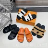 Designer de designers chinelos sandálias Beach Comfort Calfskin Sandals Sandals Summer Winter praia Plaguadores de pelúcia planície homens negros homens