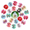 Abbigliamento per cani 50/100 pezzi di fiocchi volumi nastro peli per animali domestici elastici browknot carini accessori regalo in porcellana per cani