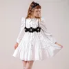 Robes décontractées au début de l'automne mignonne fille spéciale conception de fleur en trois dimensions fleur uster uster girls girls robe courte haute rue