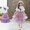 Ensembles de vêtements Korean Summer Girls 2pcs Vêtements Set Youth Girls T-shirt Imprimé Girls GOZ CAKE SKI ÉCOLE GRIPLES SETH SETL2405L24045