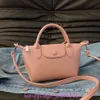 Les magasins de sacs de créateurs sont à 95% de réduction 2024 Nouveau petit pain français Mini Dumpling Single Sac à main Crossbody Womensgjev