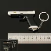 Mini Series Pendant 1: 3 Gun pistolet jouet détachable jouet semi-alliage en nylon Métal Modèle de porte-clés de travoua