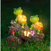 Wogoon Turtle Figurines Outdoor Decoraties, zonne -aangedreven zoete kikker gezicht schildpaddenhars standbeeld met 4 LED -lichten, tuinkunst lente herfst winter kerstdecor