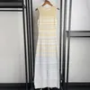 French niche 2024 spring/summer gold wire wave pattern gradient color blocking knitted round neck jacket vest long skirt