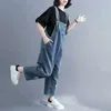 Combinaisons de sauts pour femmes Rompers Denim Assuriques pour femmes Button Design coréen Style Pantalon droit en vrac One Piece Tentime Sauthométique pour femmes Plays Curys Y240510