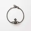 Brand Westwood Rivet Blanco Blanco Púrpura Pulsera Saturno Femenino Pequeño Diseño Classic Planet Nail