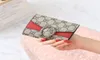 New women039s purse women039s short style trendy multi card position three fold color contrast buckle handbag small wallet3601507