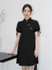 Robes de fête chic Ven Femmes Black Stand-Up Collar chinois Jacquard Bubble Brouille courte à manches moyennes Qipao Robe Summer 2024