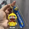 Pingente de chaveiro de desenho animado da fronteiraAtacado de chaveiros de carro de boneca de gato, bolsas, presentes