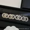 Biżuteria dla kobiet woda diamentowe litery kanały kolczyki wiatrowe wróżka celebrytka na Instagramie moda Light Luksusowe kolczyki jesienią zimą