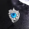Cluster anneaux somptueux rings ouverts ovales bleu vif 925 argent sterling assisté de bijoux d'anniversaire