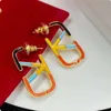 zilveren gouden oorbellen v letter druppel kleurrijke lijm zilveren naald oorbellen messing materiaal oorbellen mode oorbellen voor vrouwen