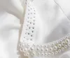 Magliette da donna top di lussuoso scollo perle fatte a mano 2024 Summer Elastic Slim Knit Sleeveless Shirt
