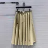 Skirts designer Nanyou Gaoding 2024 Spring/Summer New Back Metal Micro Label Age Reducing Versatile Large Skirt Hem Belt Umbrella Half skirt Y0IO