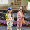 Kleidungssets 2024 Sommermädchen Kinder Blumendruck Kurzarm Tops Hosen 2pcs Baby Lose Blumen -T -Shirts Anzug Fashion Kid Cotton Set