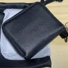 本物の革驚くべき小さな財布デザイナーカードホルダーミニジッパーブラックウォレット女性コインプロクスハンドバッグ