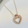 Collane a ciondolo 925 Gioielli di moda a mezza zircone del cuore di pesca argento sterling (DJ2311)