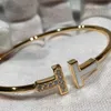 Unieke bedelarmband ontworpen voor geliefden Gold dubbele armband 18K roségoud met gemeenschappelijke Tifanley