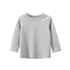 T-shirts 7 colors of childrens T-shirts cotton long sleeved solid color bottom coat casual wear for boys and girls top for childrens clothingL2405