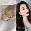 Nieuwe Designer oorbellen Women Gold Metal Ring Fashion Love Heart Earrings Stud vrouwelijke zus bruiloft diamant premium minimalistische oorbellen 18k feest sieraden
