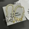 Brand Westwood Pearl Love Pin Bracciale Female Lumo Lusso piccolo e popolare Nail in versione alta Saturno Peach Heart