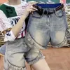 Short féminin Golden Rivet Patchwork Denim Slim High Waist Street Summer 2024 Jeans de mode WZ8545