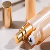 Opslagflessen 20 stks/kavel 10 ml lege parfumspray -glazen fles gouden parelparled filmroller op etherische olie