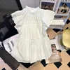 Blouses des femmes chemises blanches et y2k vintage coréen harajuku 2000s modes élégantes à manches courtes à manches courantes