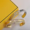 Bracelets de diamants ouverts créateurs de mariage Gold Bangle Bracelet en argent en acier inoxydable Bracelet Bangles Femmes Men Couple de lettres classiques Bijoux Accessoires