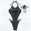 Costumi da bagno femminile sexy a corda nera Halter Supuit senza schienale con donne Flower One Piece 2024 Abito da bagno a taglio alto