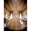Luxurious 2016 Saudi Arabic Lace Appiqued Gold Dresses Muslim Long Sleeves Wedding Gown Dubai Modest Bridal Gowns A Line 0510